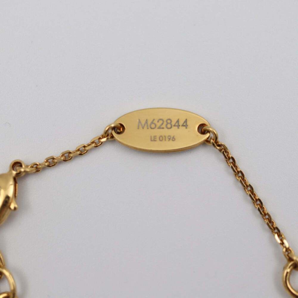 LOUIS VUITTON Gold Love Charm Bracelet - Picture 6 of 7